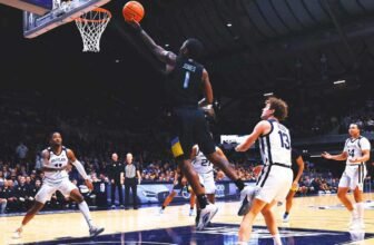 No. 9 Marquette overcomes foul trouble, slow start...