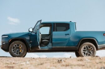 Rivian inches closer to profitability but warns &#...