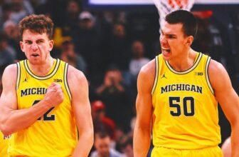 No. 22 Michigan rallies late to beat No. 18 Wiscon...